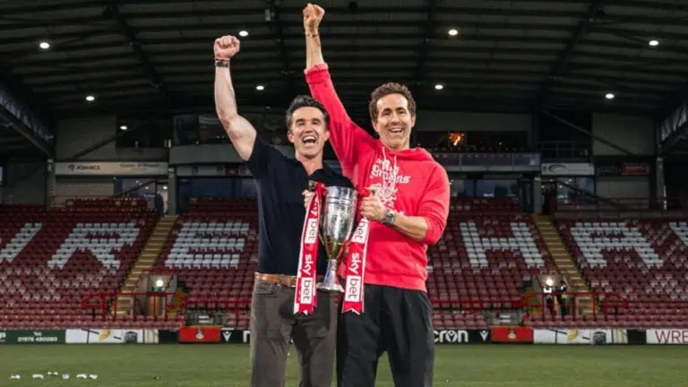 Two people on a soccer field