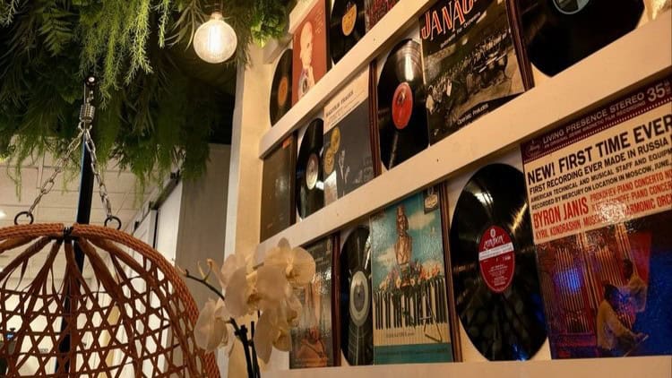 Vinyl records on the wall at Spinning Coffee in Bradenton