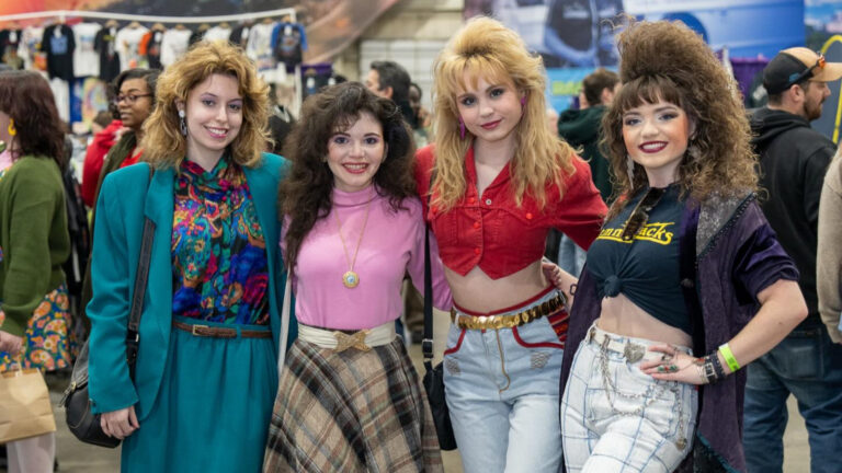 people posing in vintage clothing